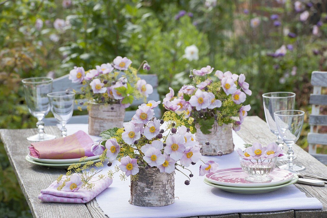 Table decoration with autumn anemones and fennel