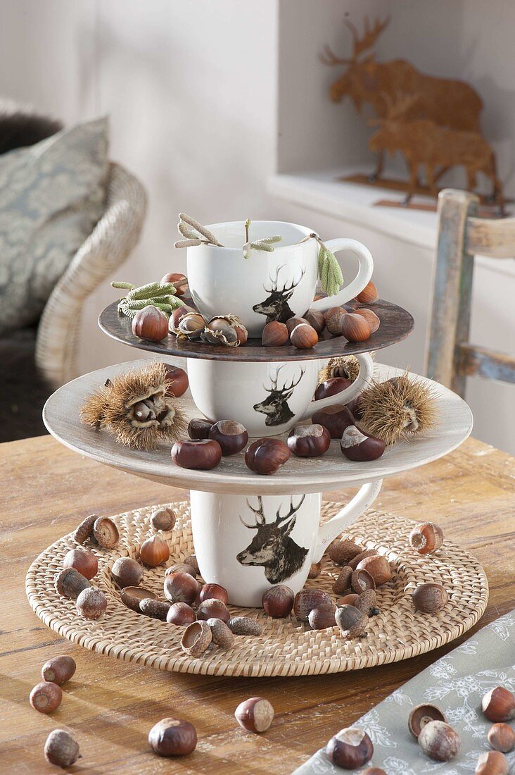 Self-made etagere out of cups with deer-decoration
