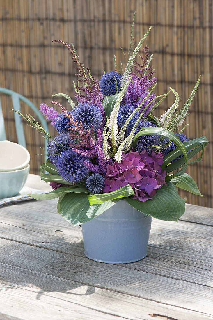 Bouquet made of perennial flowers and grasses, Echinops (Globular thistle)