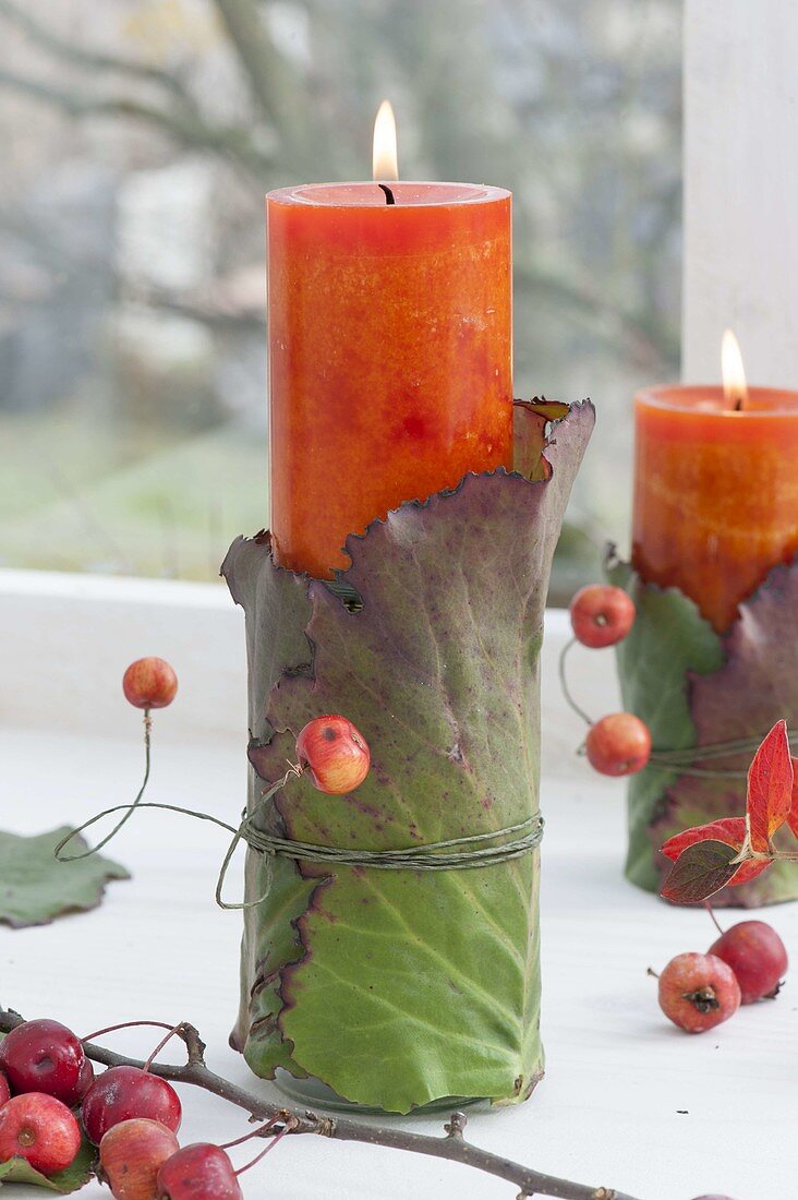 Natural candle deco on the window