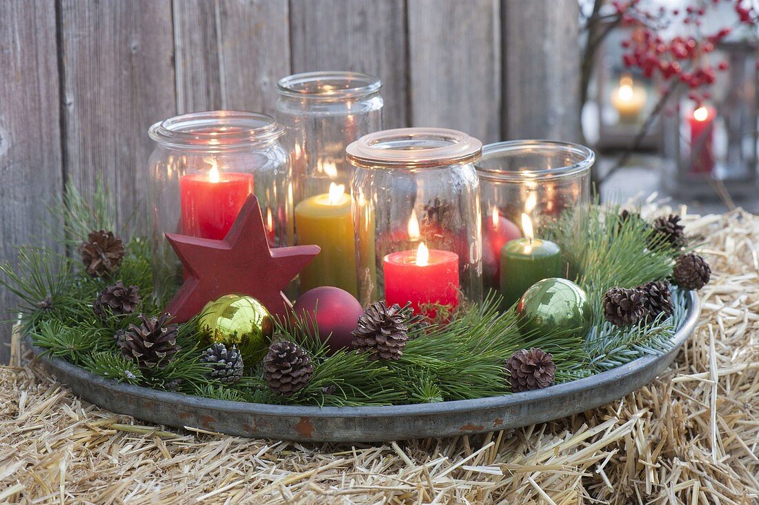 Advent wreath made of preserving jars as lanterns