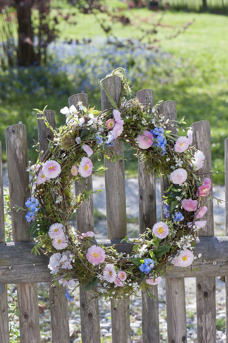 Wicker wreath with spring flowers