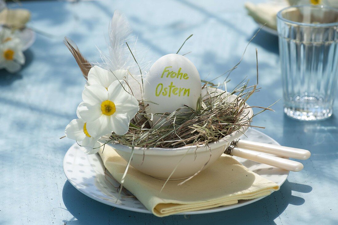 White Easter table decoration on the terrace
