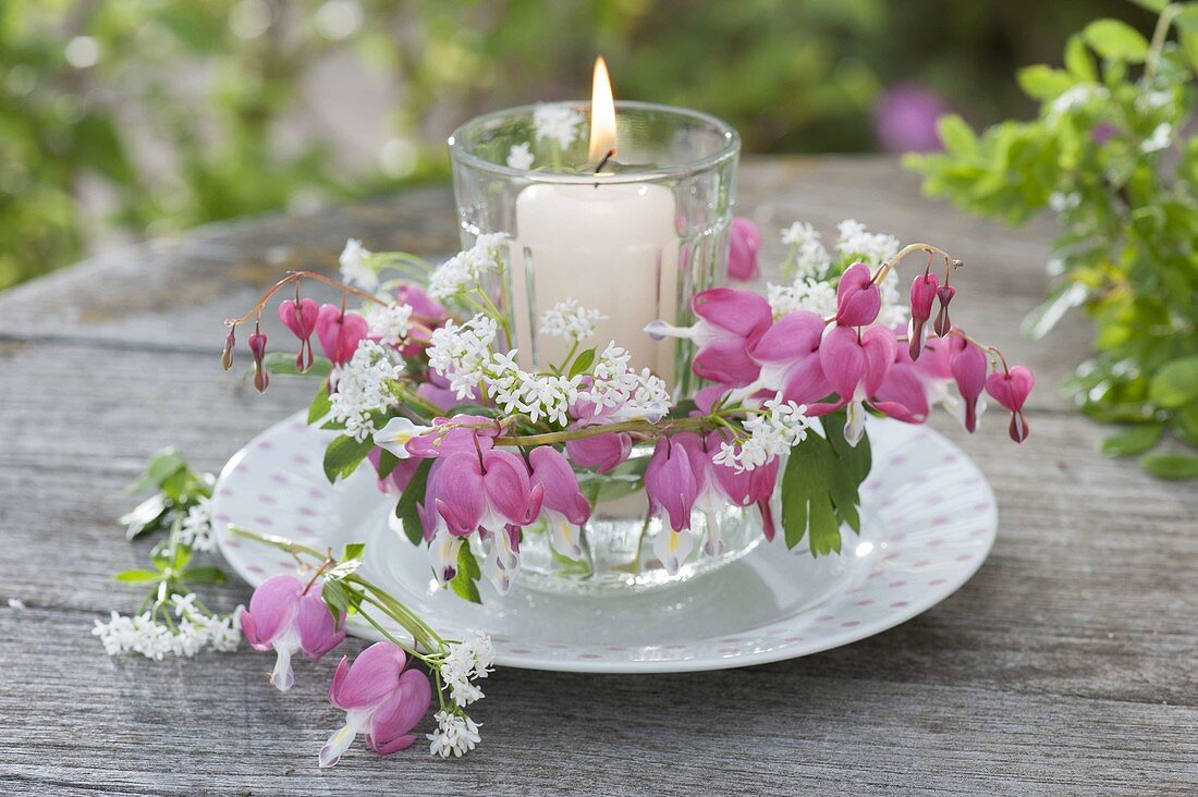 Romantic lantern with dicentra flowers