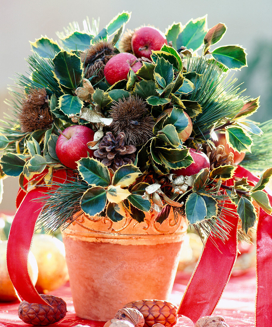 Advent bouquet with olive branches, apples, pines