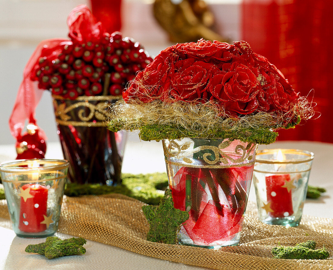 Bouquet of red roses with gold glitter, moss star, angel hair, rose rosehips