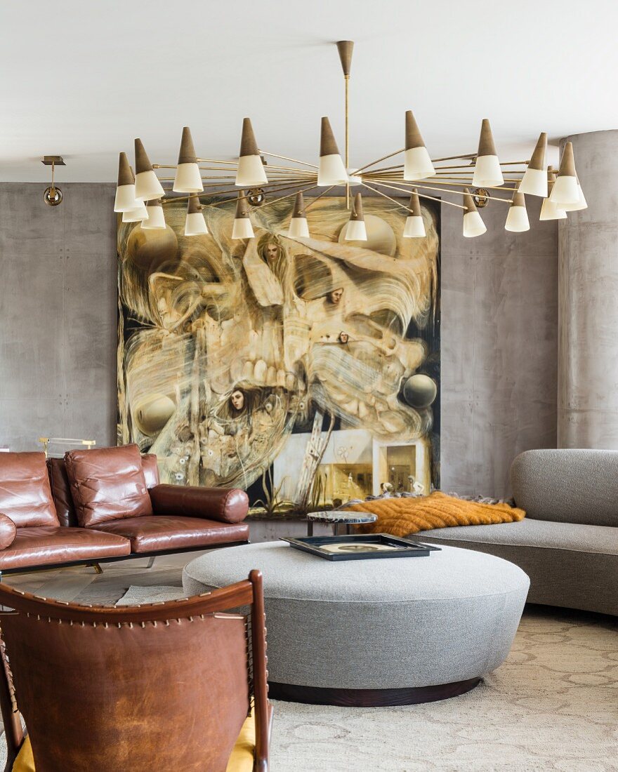 Large modern artwork in lounge area with 50s lamps