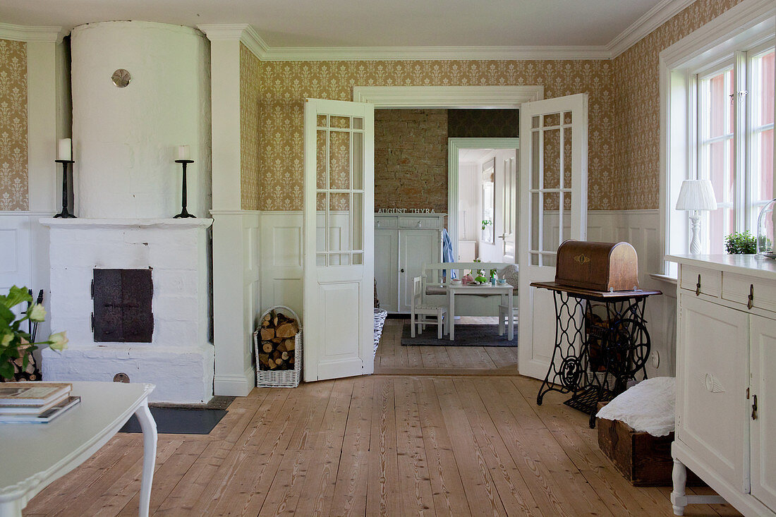 Tiled stove and double doors in classic living room