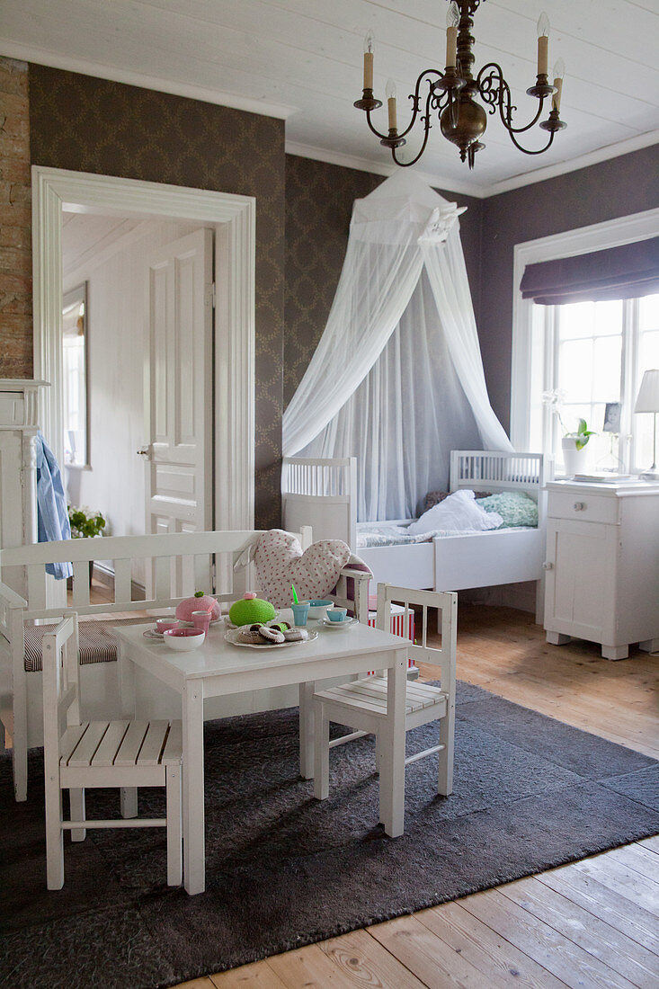 Vintage-style nursery with brown wallpaper