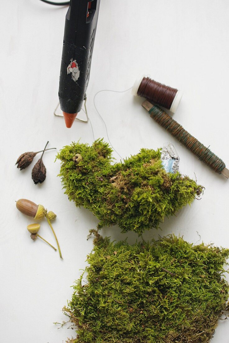 Making a bird ornament from moss