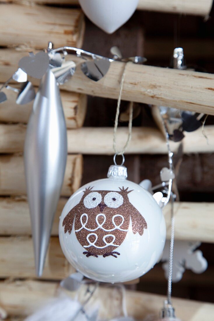 Glitter owl motif on Christmas bauble