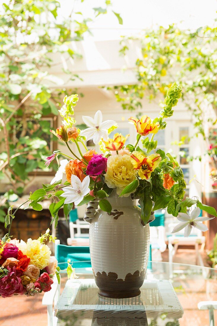 Summery bouquet on terrace table