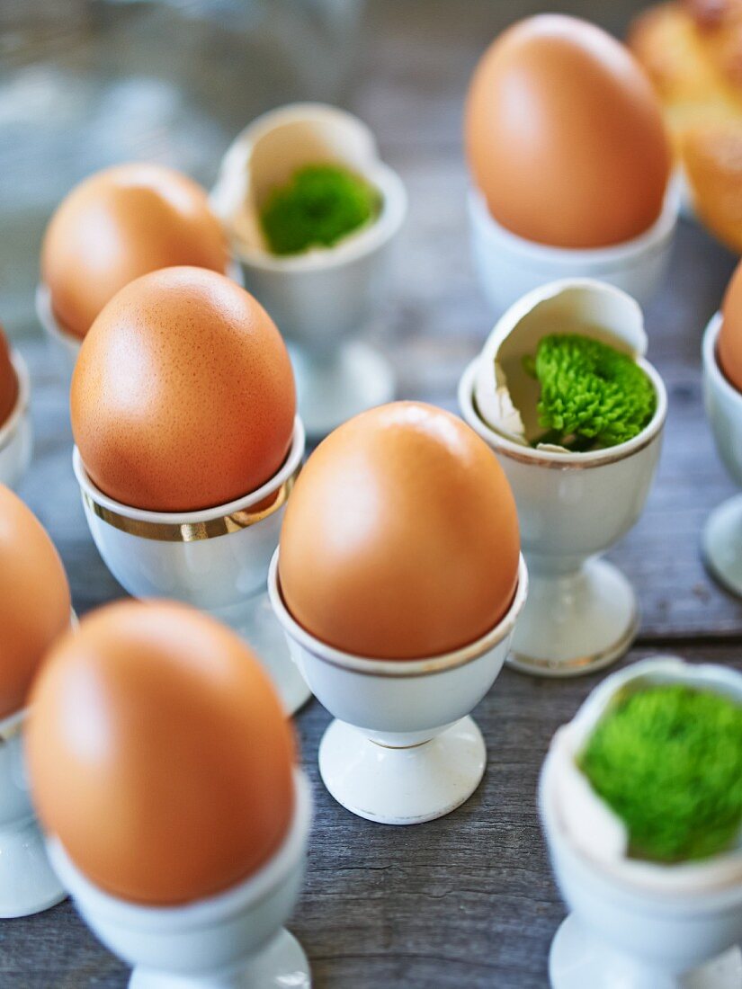 Eggs in egg cups on Easter buffet table