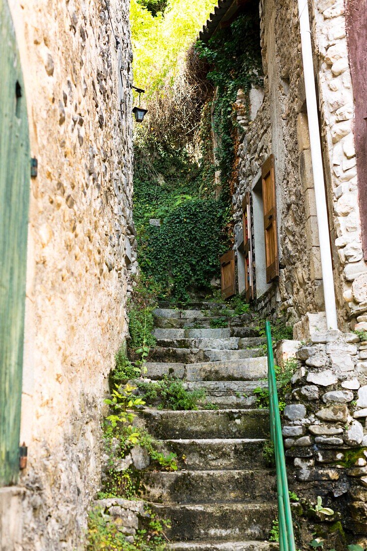 Steep stone steps between Mediterranean houses