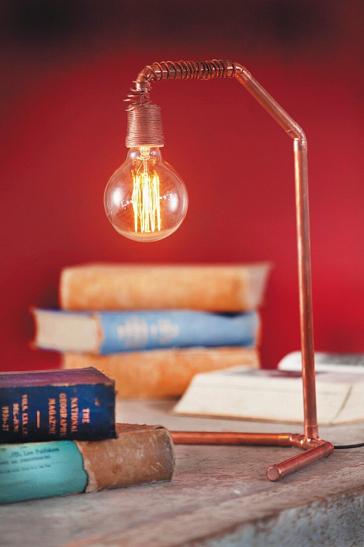 DIY reading lamp made from copper pipe and light bulb