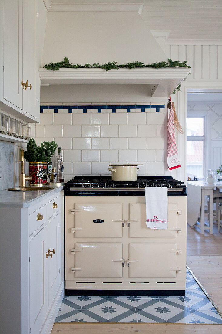 Vintage-style AGA cooker in Swedish country-house kitchen