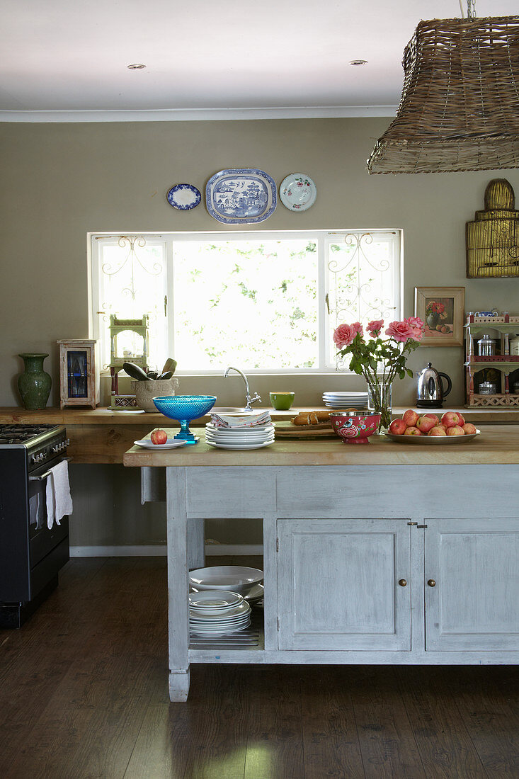 Wooden island counter in rustic kitchen