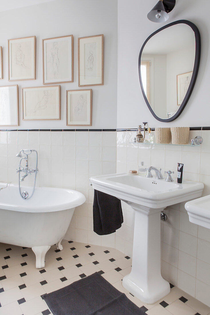 Half-height tiled wall in vintage-style bathroom