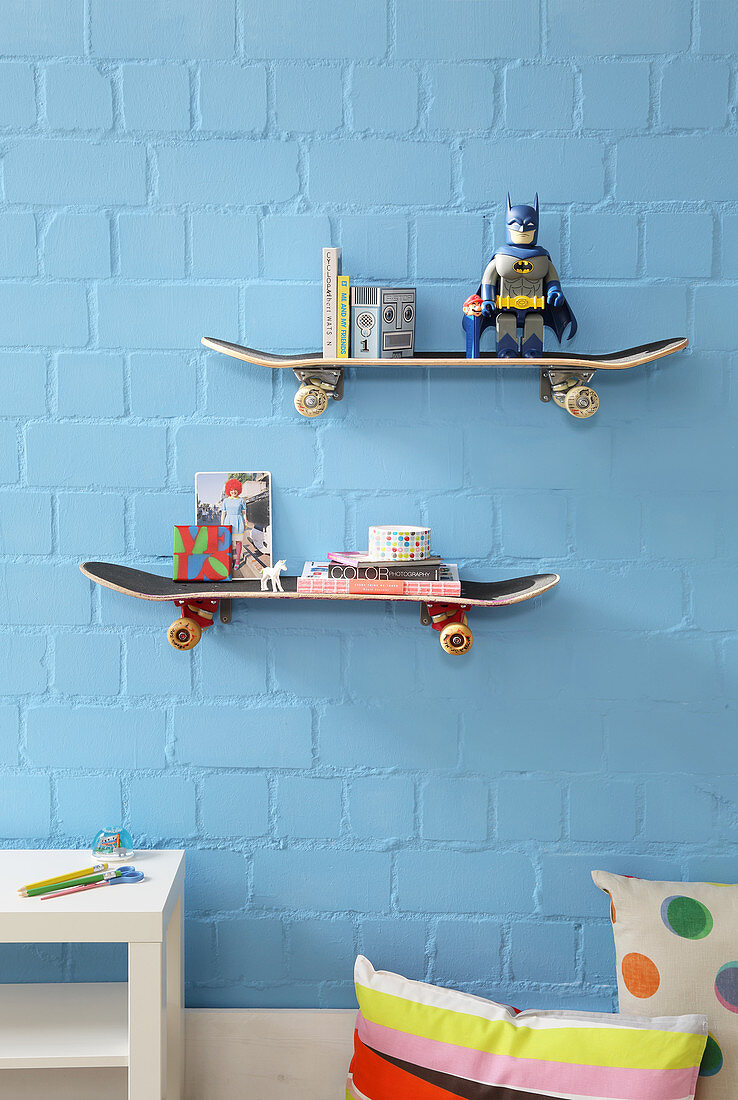 Wall-mounted shelves made from skateboards