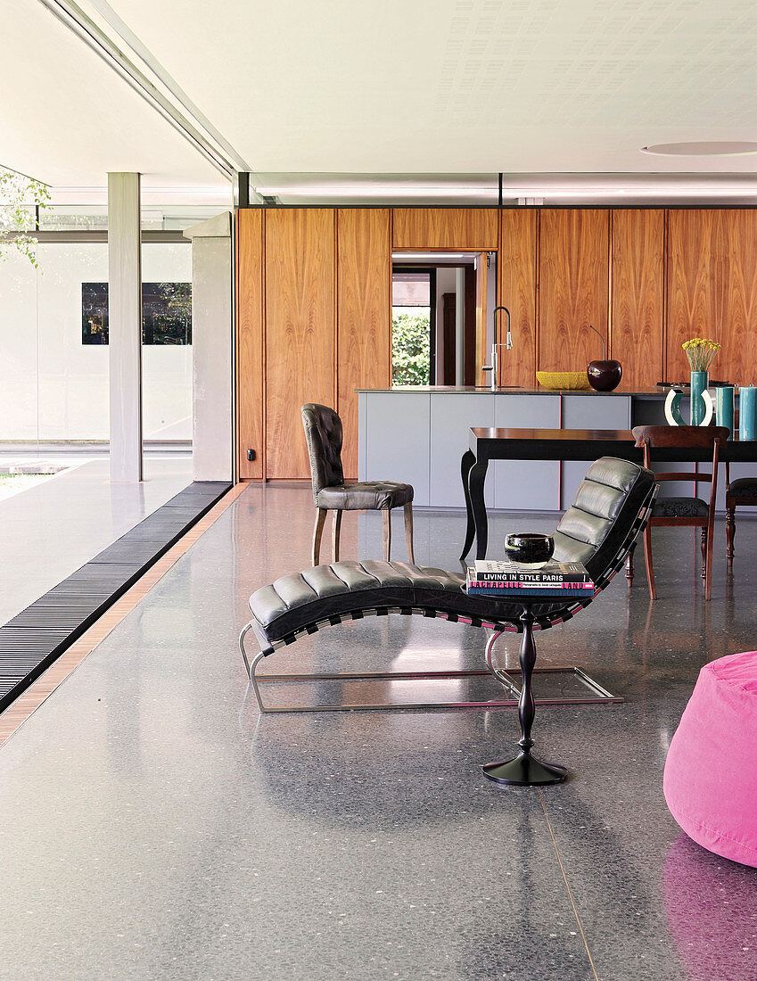 Terrazzo floor in open-plan interior of architect-designed house