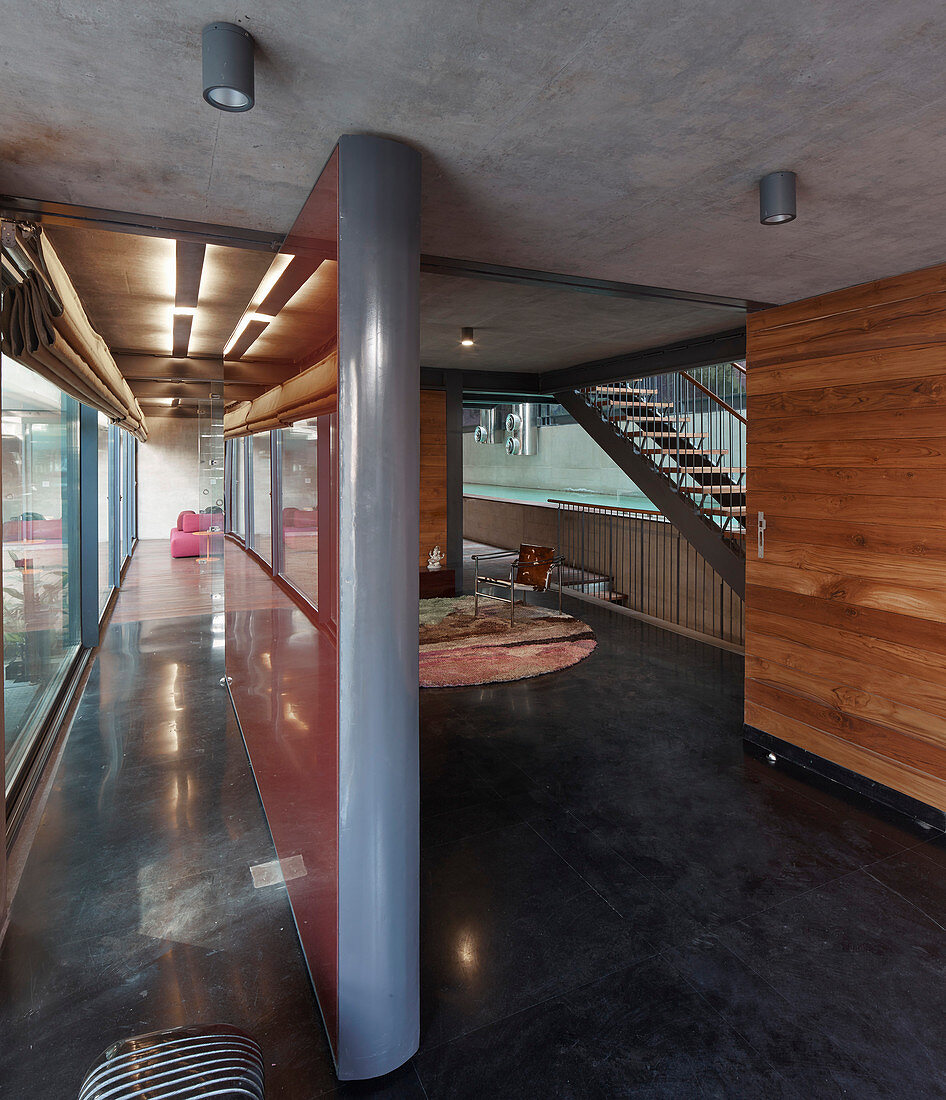 Partition wall in modern architect-designed house made of concrete and steel
