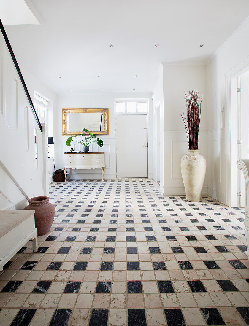 Black-and-white, patterned tiled floor in foyer