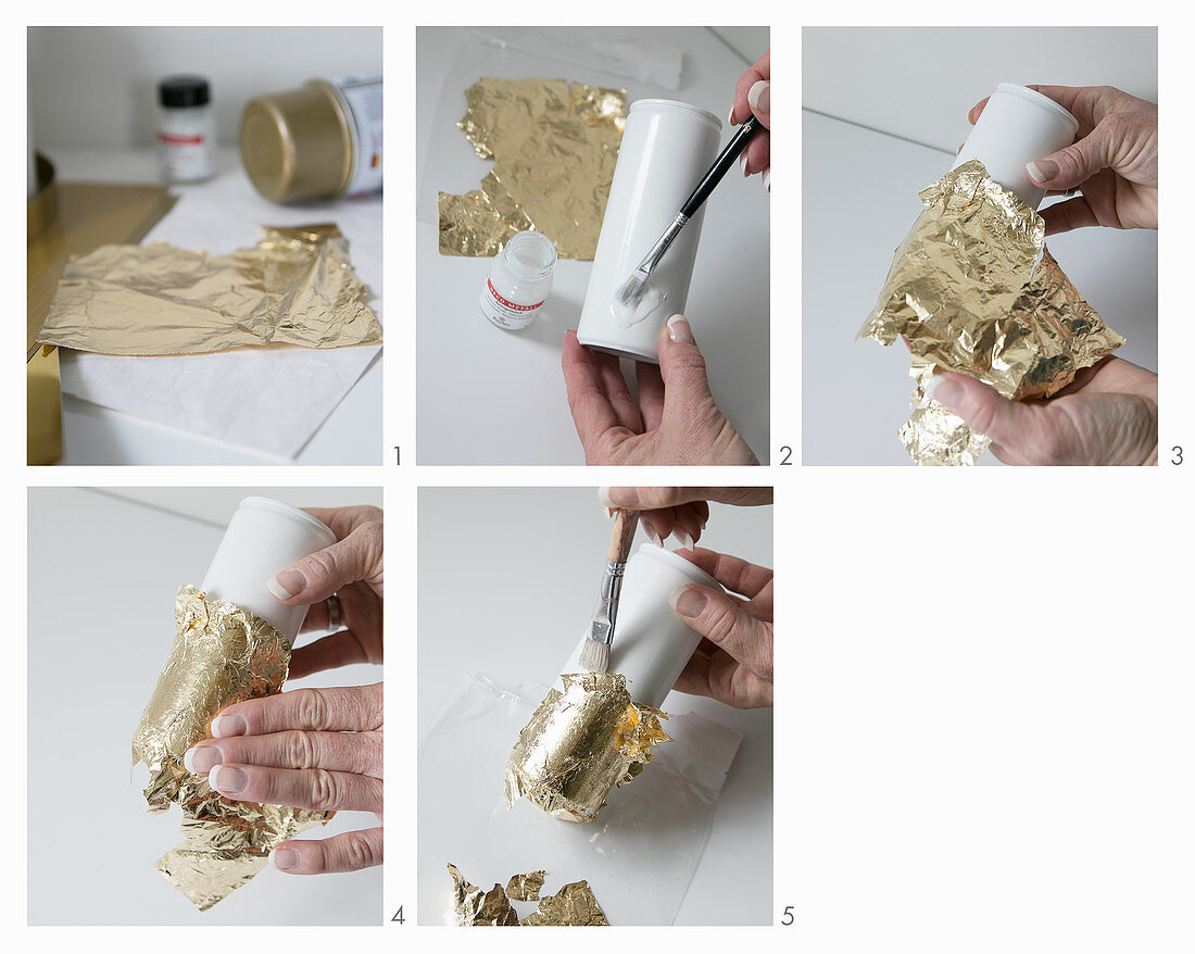 Hand-crafting vases: decorating drinks can sprayed white with gold leaf