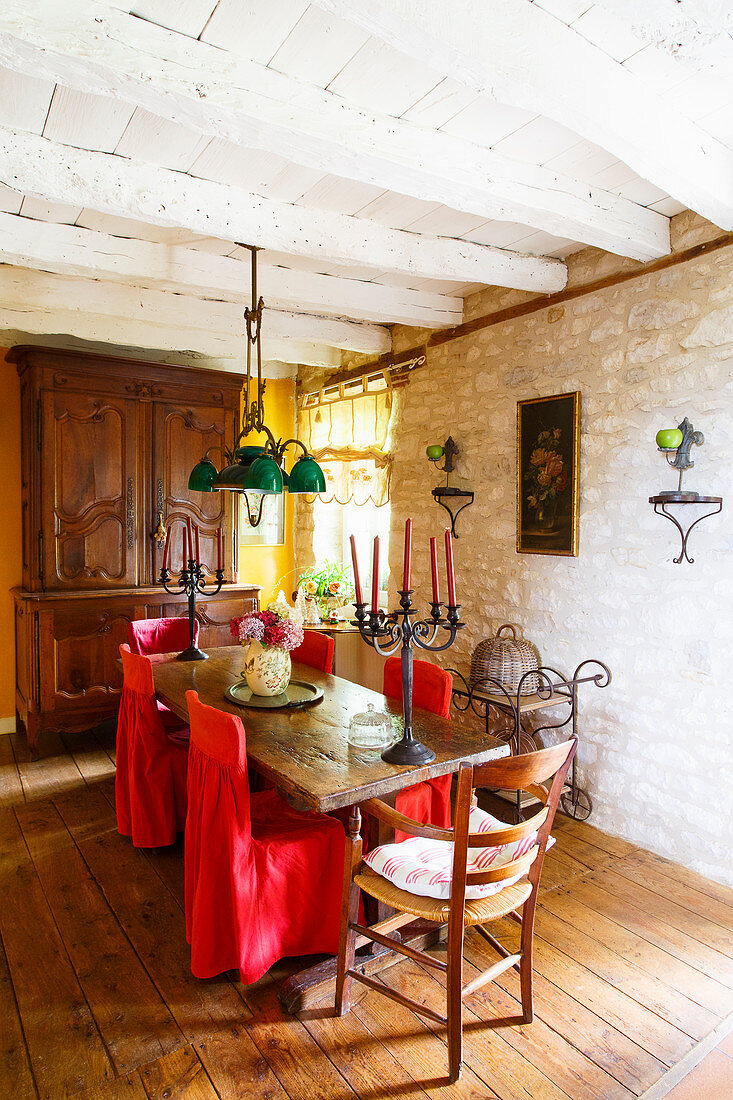 Mediterranean country-house dining room with stone walls
