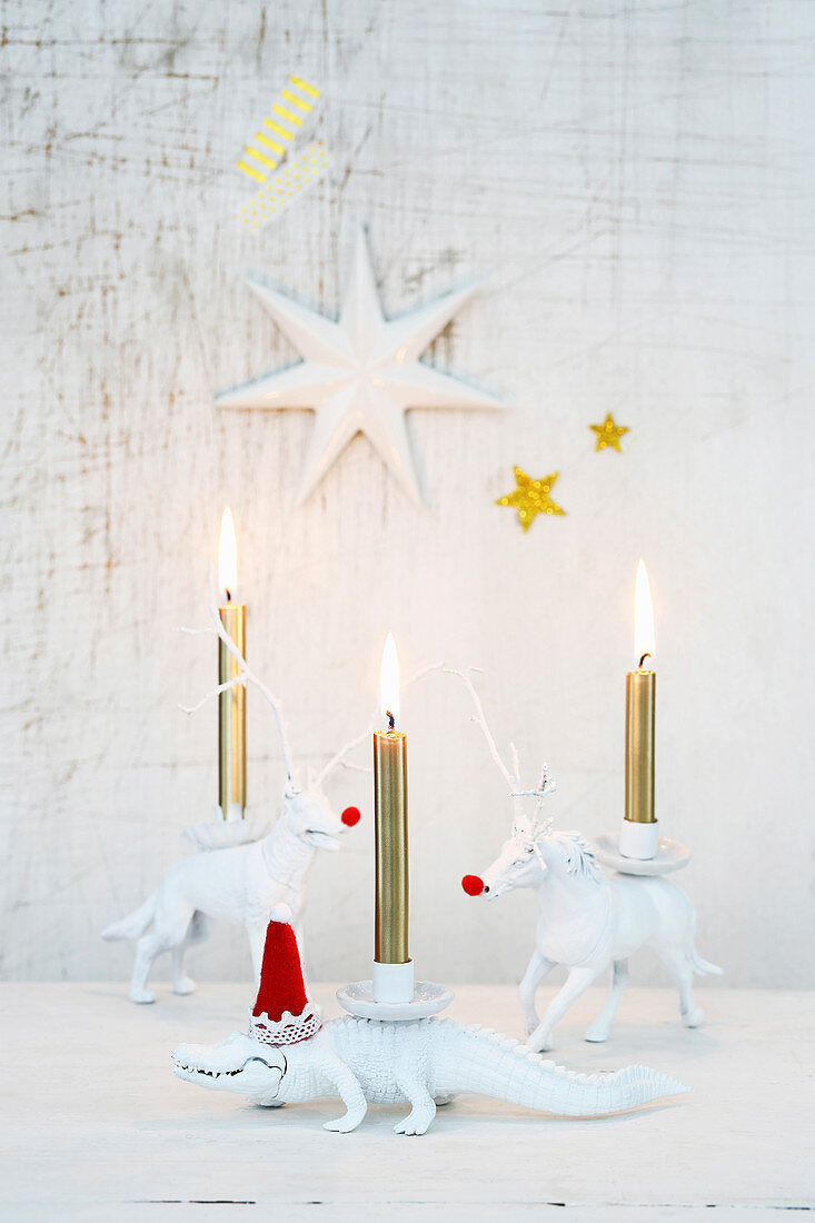 Plastic animals used as candle holders