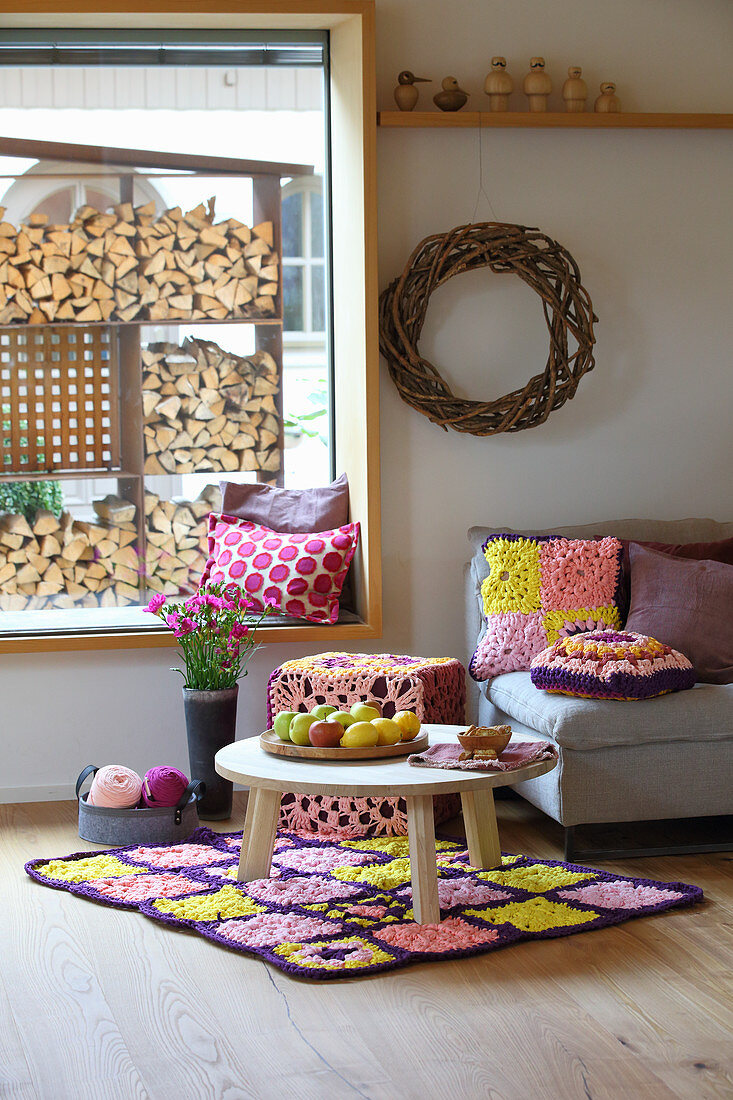 Crocheted home textiles in country-house-style living room