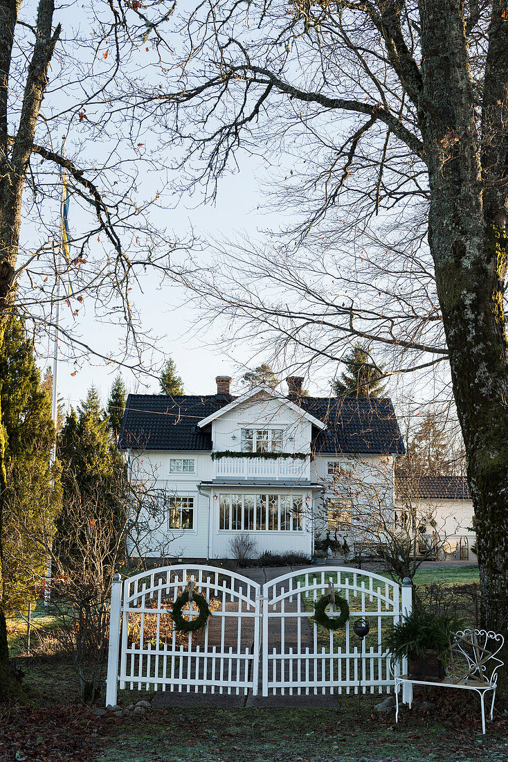 Festively decorated front gate of Swedish house