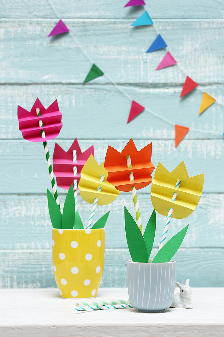 Tulips made from striped drinking straws and craft paper