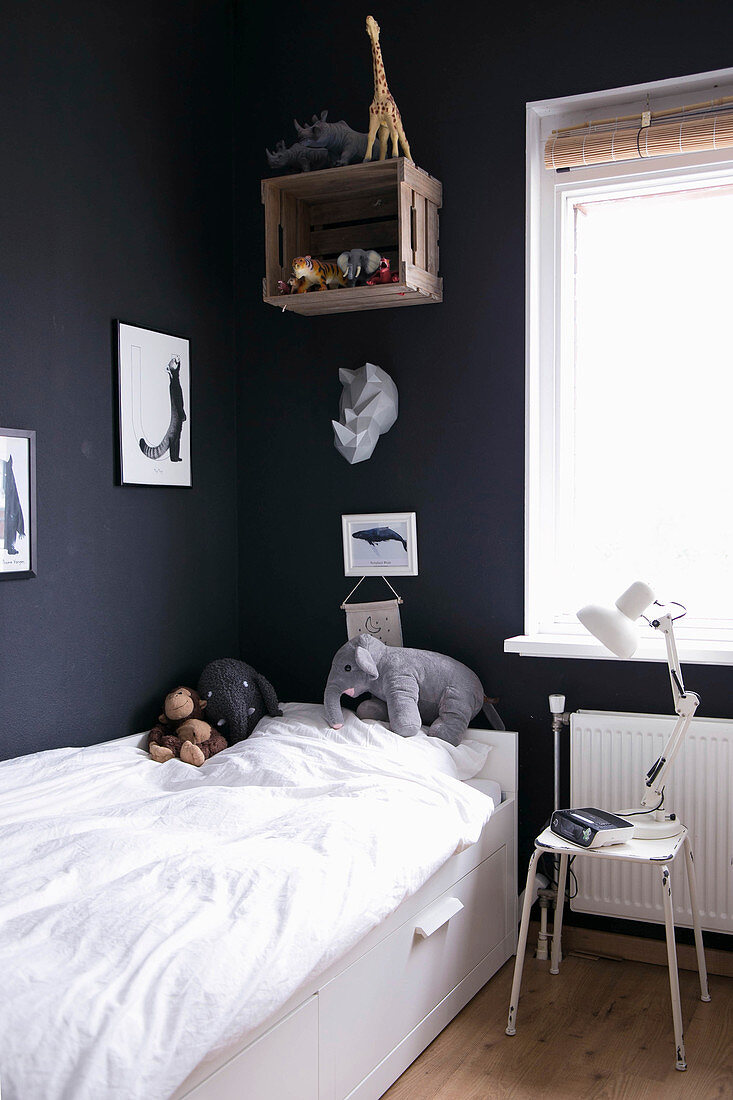 Child's bedroom with black walls