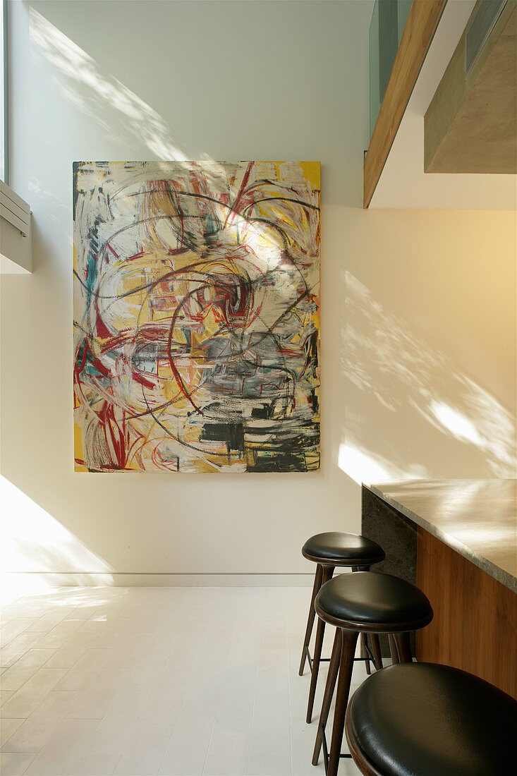 Large abstract painting on sunny wall