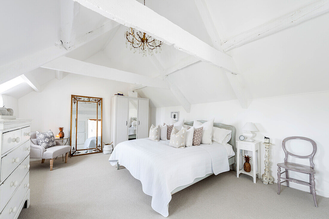 Rustic attic bedroom in white and grey