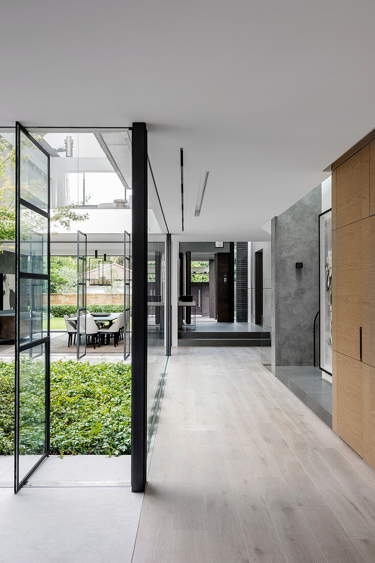 Elegant hallway with glazing in the architect's house