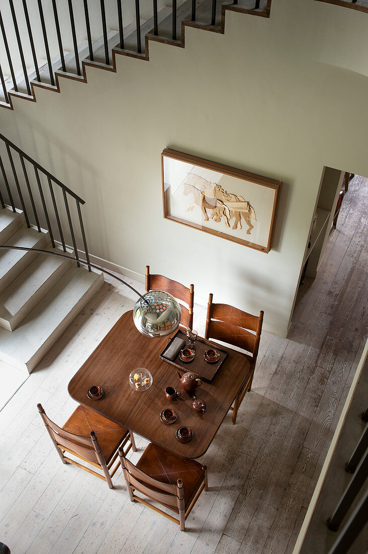 View down onto vintage-style wooden dining tabl