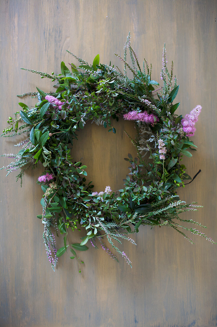 Green wreath with pink flowers