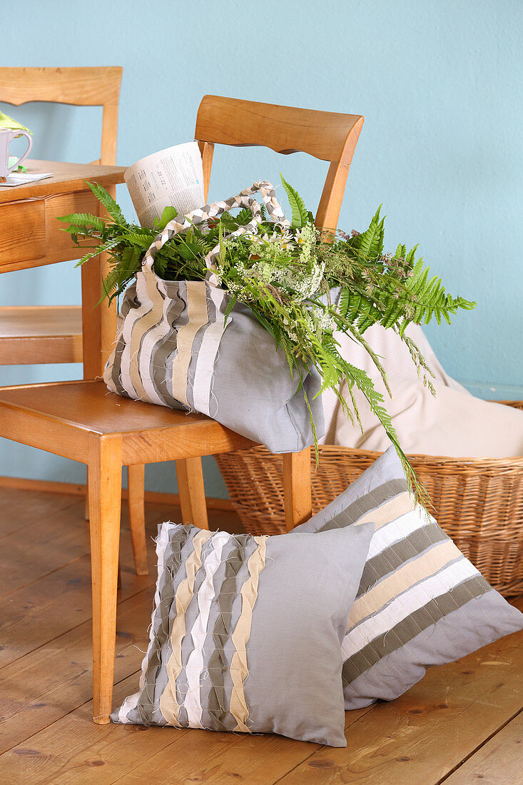 DIY linen bag and cushion covers decorated with fabric strips