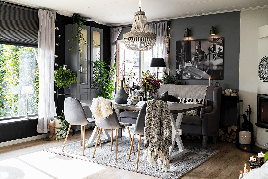 Cosy, Scandinavian-style dining room in shades of grey