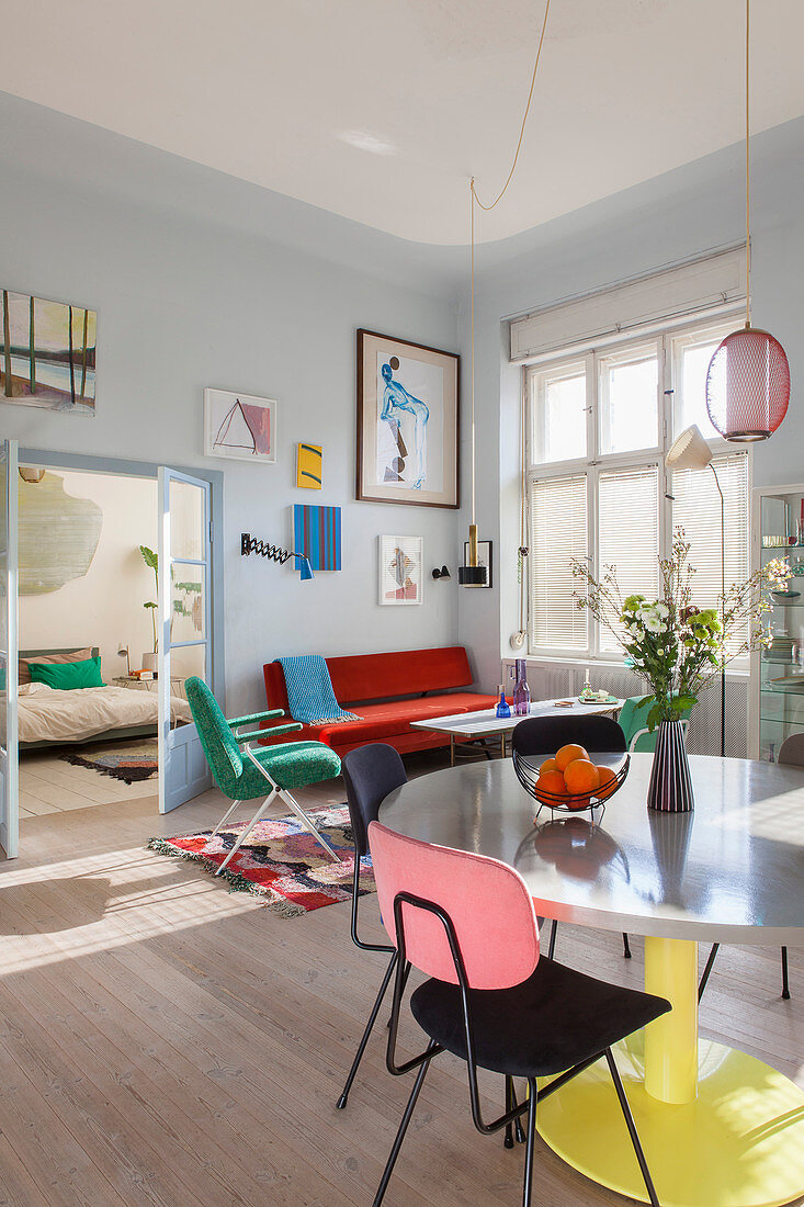 Colourful retro furniture in sunny interior of period building