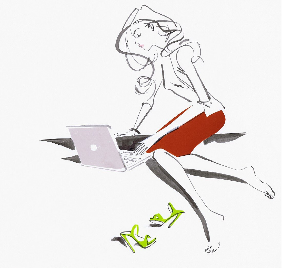 Schöne Geschäftsfrau benutzt einen Laptop barfuß auf dem Boden sitzend