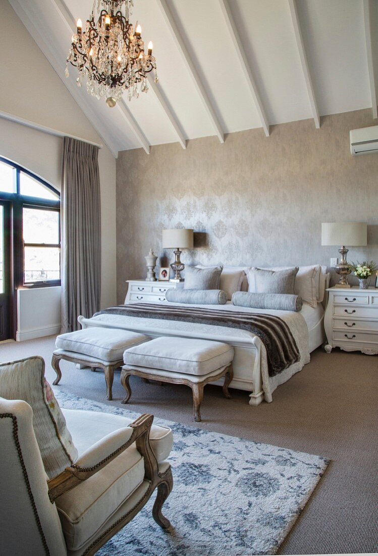 Glamorous French-style attic bedroom