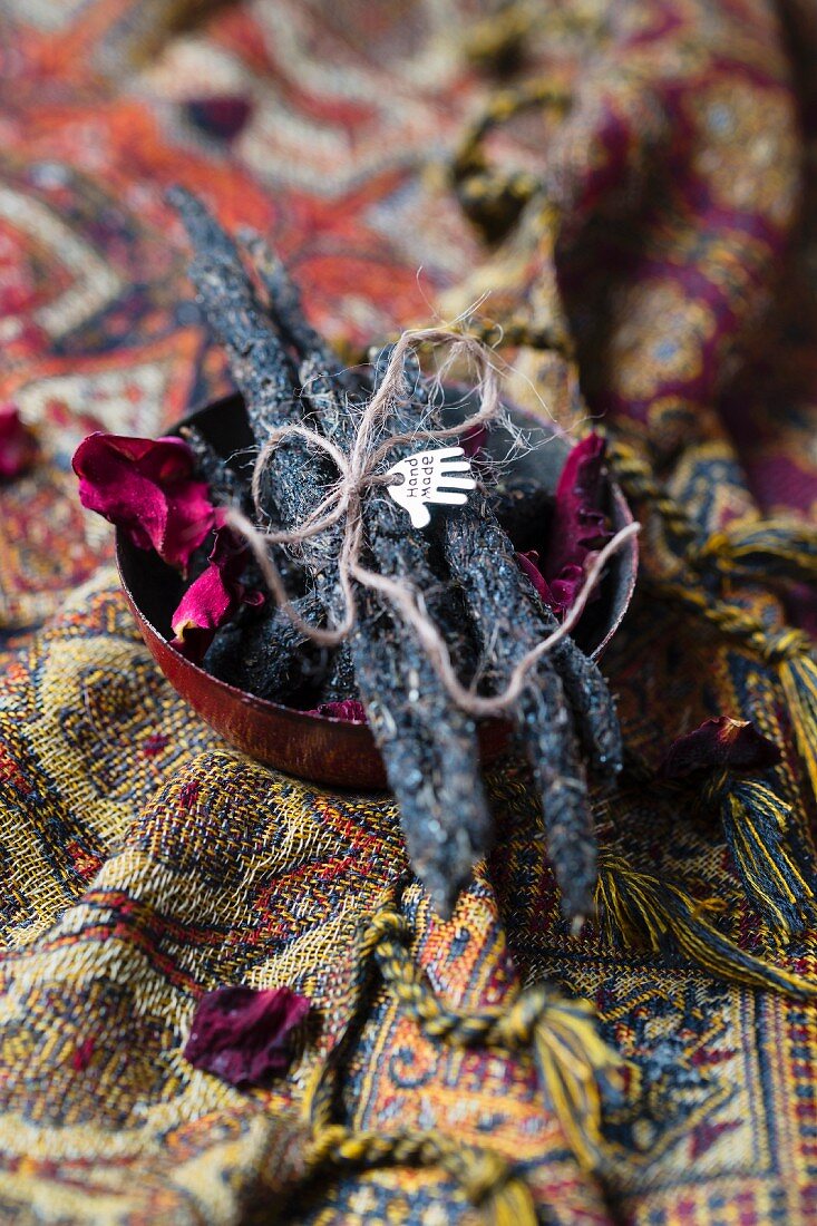 Smudge sticks hand-made from charcoal, resin, dried herbs and rose petals
