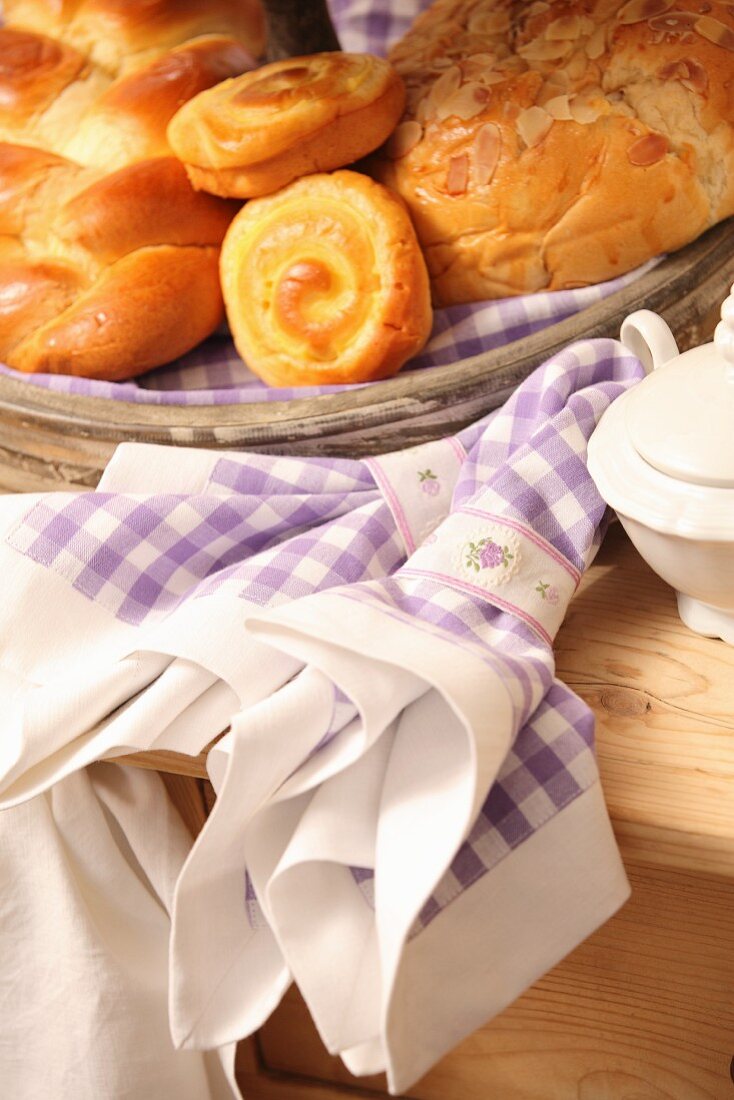 Hand-sewn linen napkins next to tray of pastries