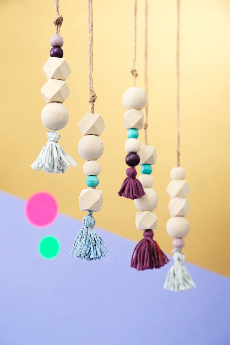 Pendants made from wooden beads and tassels