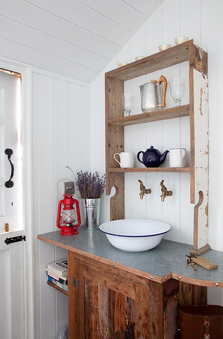 Rustic washstand made from recycled wood and enamel bowl