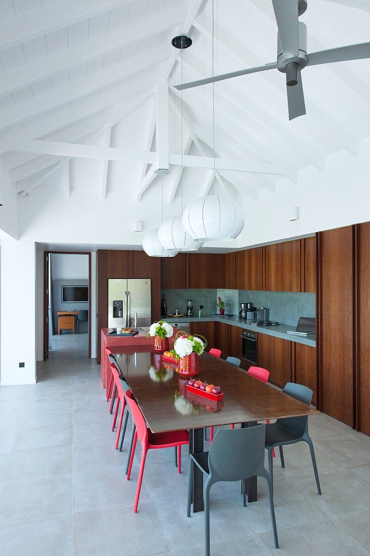 Black And Red Chairs Around Dining Table Buy Image 12314699 Living4media