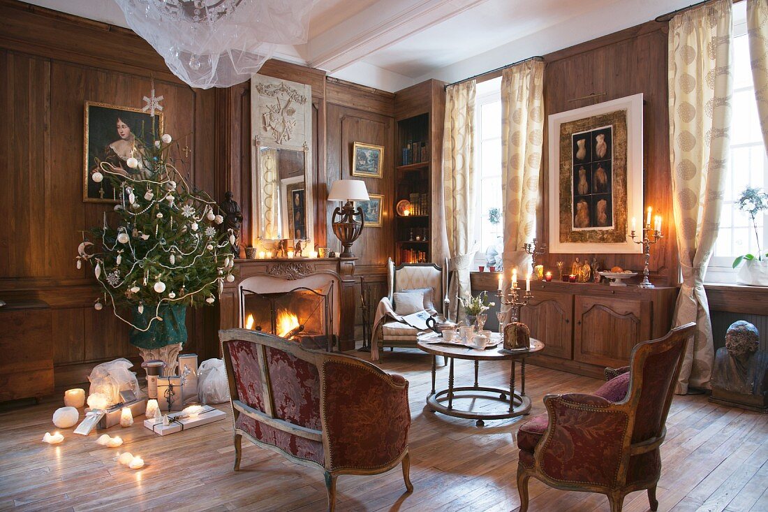 Christmas tree, antique furniture and open fire