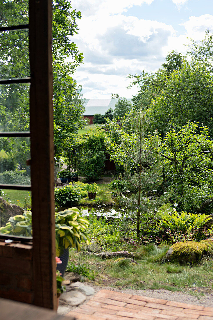 View of pond in garden from orangery